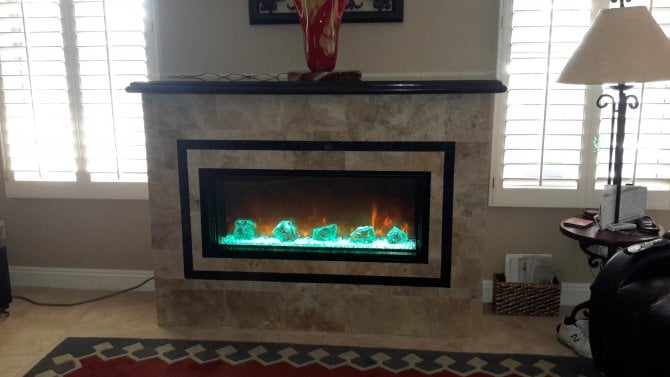 Electric Fireplace with Glowing Decorative Rocks | Angie's List
